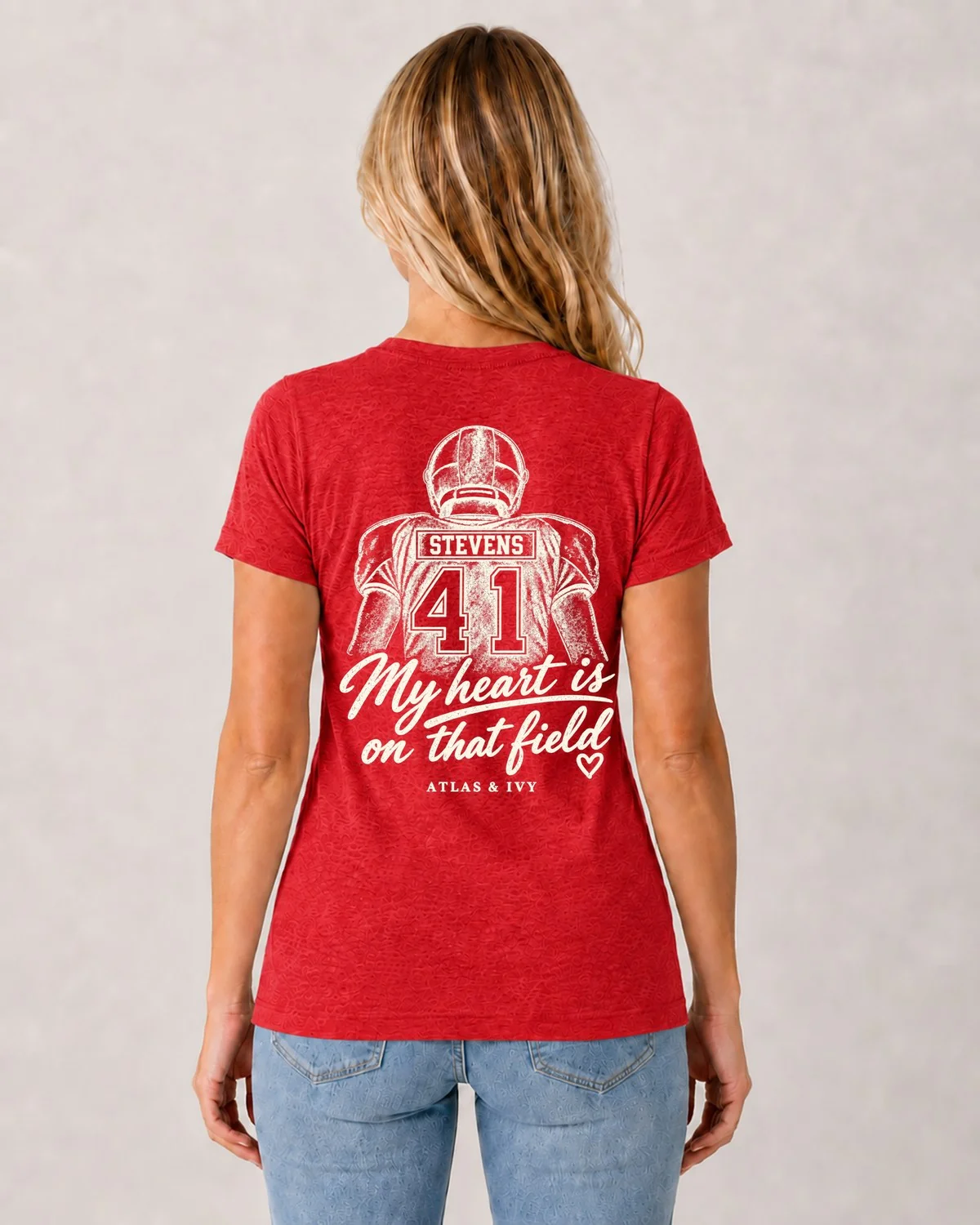 The Fieldside Heart Tee — custom football mom shirt with player name and number by Atlas & Ivy